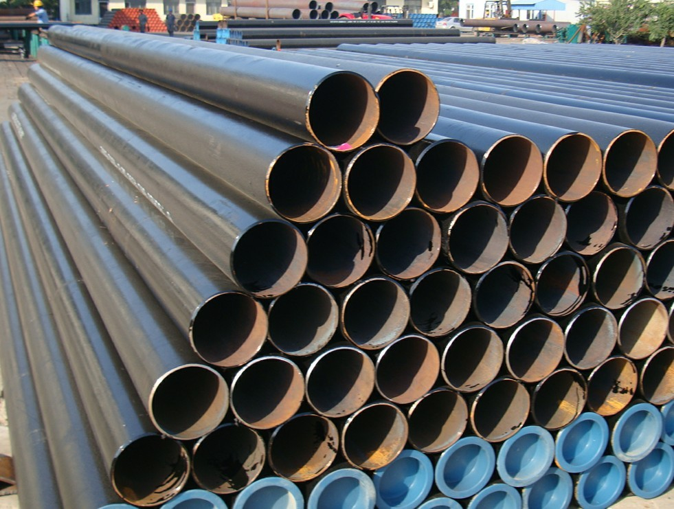 Identification method of welded pipe and seamless pipe