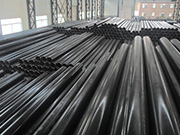 What causes steel pipes to bend during production