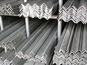 What causes numerous black spots to appear on hot-dip galvanized angle steel