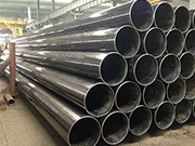 What are the details regarding the cost-effectiveness of stainless steel welded pipes compared to seamless pipes
